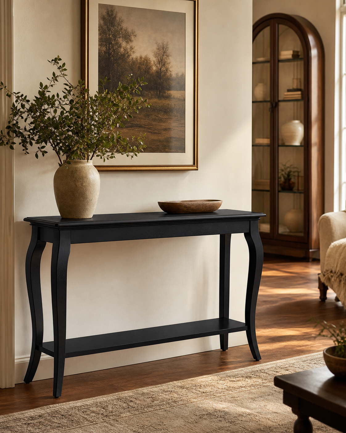 Narrow console table styled in an entryway